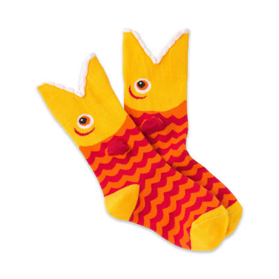 orange and yellow crew socks with red and orange wave pattern. cartoon piranha design with big eye and sharp white teeth.   