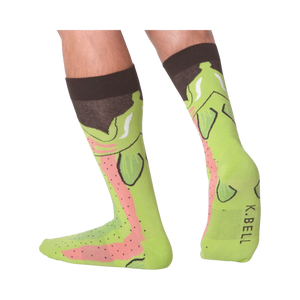 Lifestyle shot showing the Leg Eater Trout socks on a person's legs.