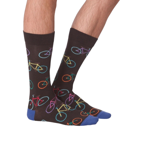 Lifestyle shot of male model wearing the Bright Bikes socks, showcasing how they look when worn.