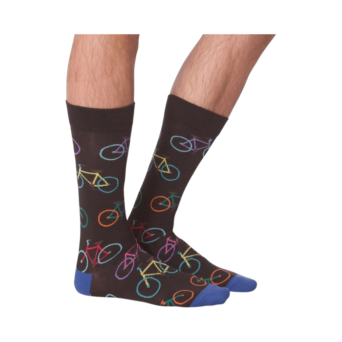 Lifestyle shot of male model wearing the Bright Bikes socks, showcasing how they look when worn.