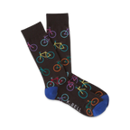 Pair of brown crew socks with colorful bicycle designs. Blue cuffs. 