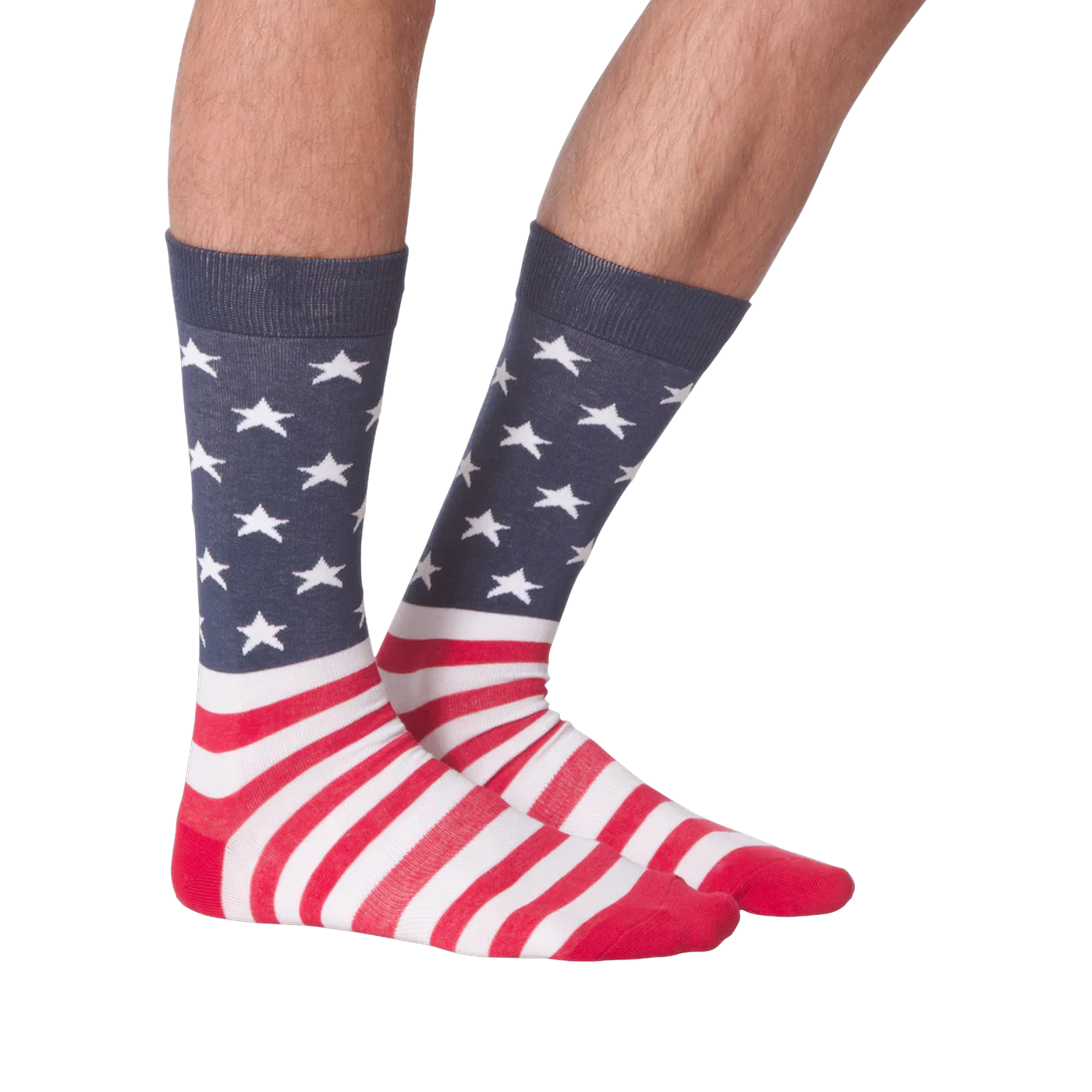 Another lifestyle shot of a pair of American flag socks on a person's legs.