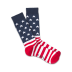 Pair of crew socks in red, white, and navy blue.  The socks feature a design of white stars on navy blue at the top and red and white stripes at the bottom, reminiscent of the American flag.