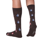 Lifestyle shot: Men's legs wearing dark brown crew socks with red and blue electric guitars.  Socks are shown from the front and back.