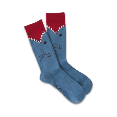 blue crew socks feature a ferocious shark pattern with open mouth and sharp teeth.  