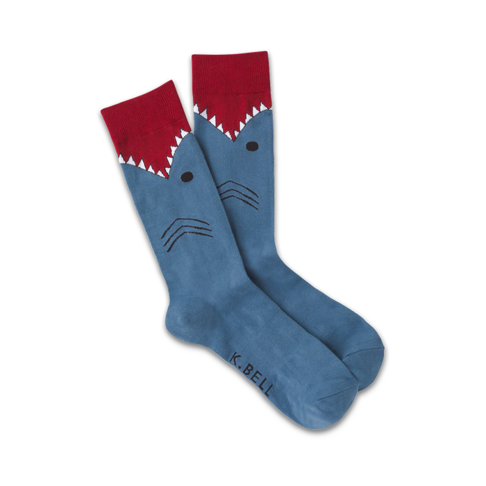 blue crew socks feature a ferocious shark pattern with open mouth and sharp teeth.  