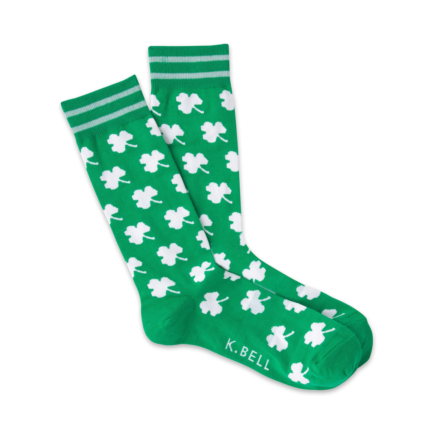 Pair of green crew socks with a white shamrock pattern and light grey stripes at the top. The socks have a 'K.BELL' logo.