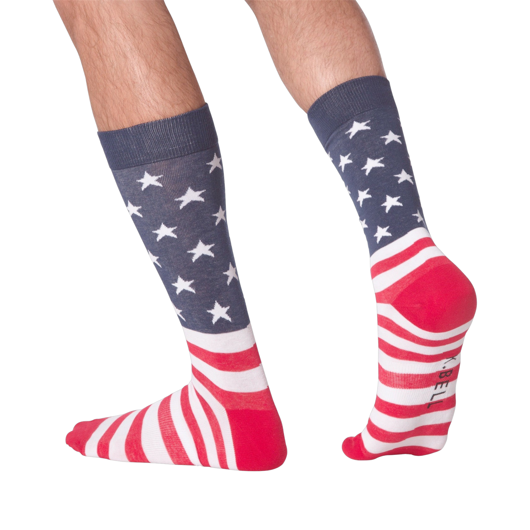 Man's legs wearing American Flag XL socks, showcasing the back and side view against a black background.