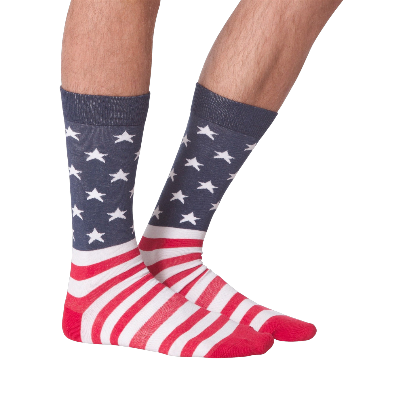 Close-up view of a pair of American Flag XL socks on a person's feet; showcasing a front view against a black background.