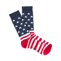 Pair of red, white, and blue crew socks. The top features a navy blue background with white stars; the bottom has red and white stripes. 'K.Bell' is subtly visible on the heel.