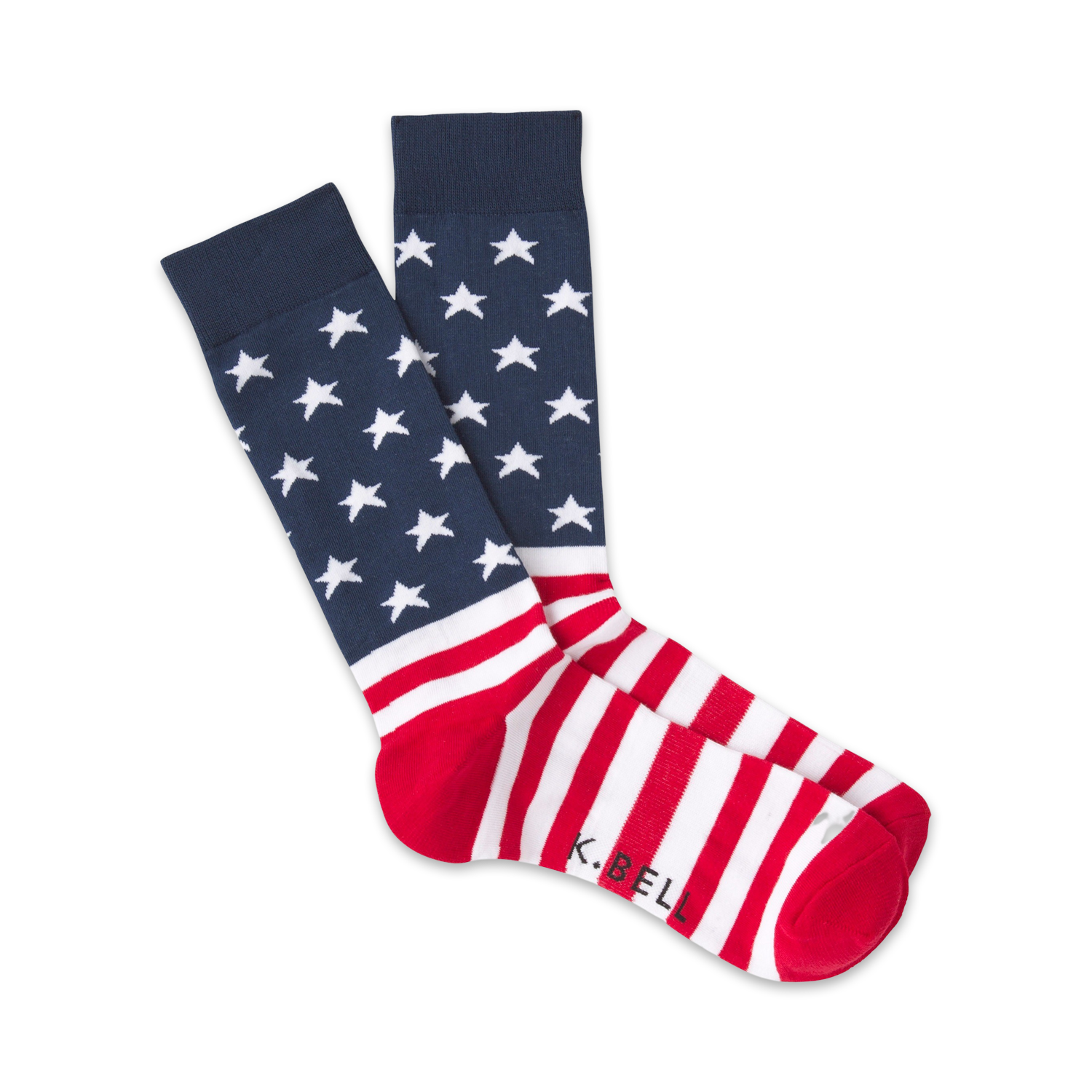 Pair of red, white, and blue crew socks. The top features a navy blue background with white stars; the bottom has red and white stripes. 'K.Bell' is subtly visible on the heel.
