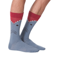 Another lifestyle shot showing the Shark XL socks from the back on a person's legs.