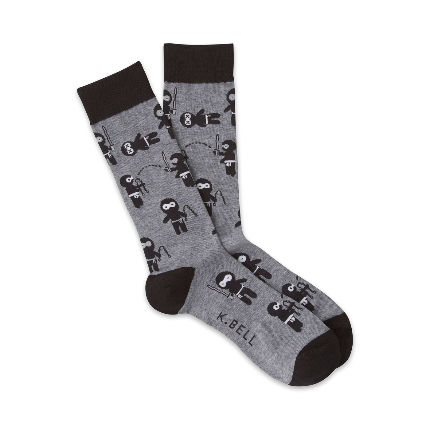 Pair of gray crew socks with a repeating pattern of black cartoon ninjas.  Ninjas are depicted in various playful poses.