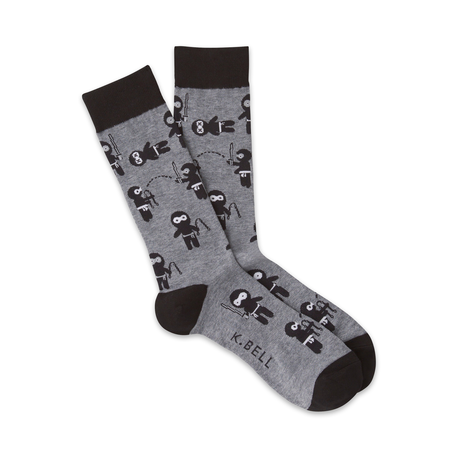 Pair of gray crew socks with a repeating pattern of black cartoon ninjas.  Ninjas are depicted in various playful poses.