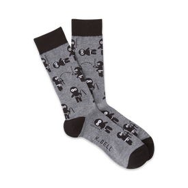 gray crew socks with a pattern of black ninjas in various poses, throwing stars, swinging swords, and jumping.  
