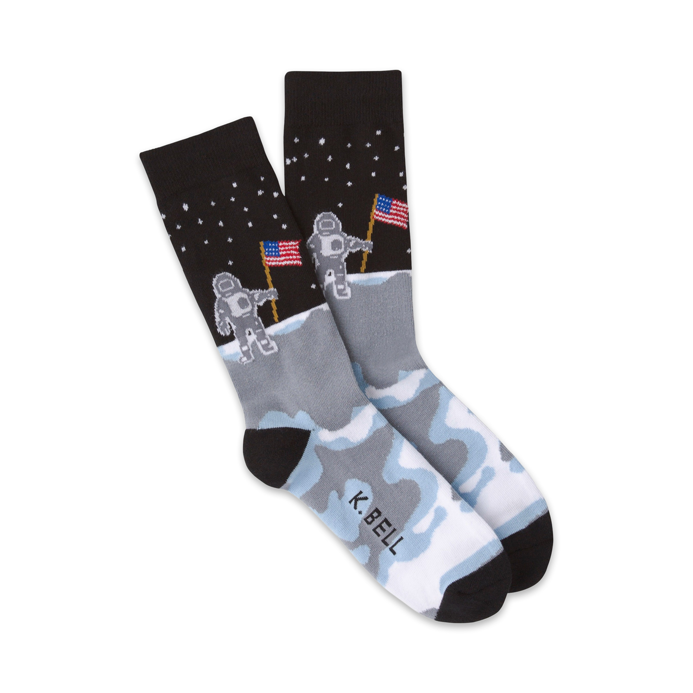 Pair of crew socks in black, gray, and white. The design features astronauts planting American flags on the moon.
