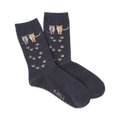 Pair of navy blue crew socks with a design of cat rear ends and paw prints in beige and gray.