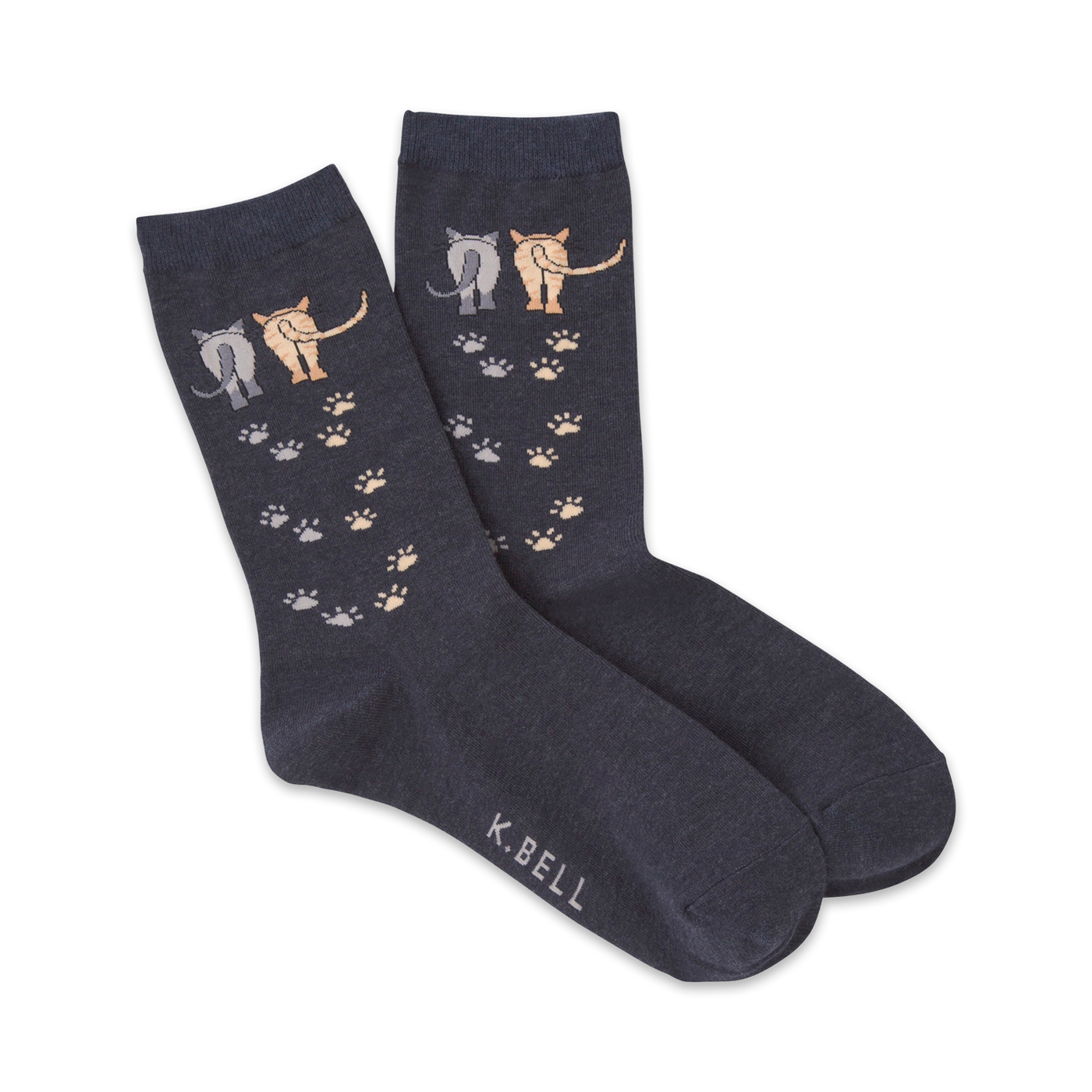 Pair of navy blue crew socks with a design of cat rear ends and paw prints in beige and gray.