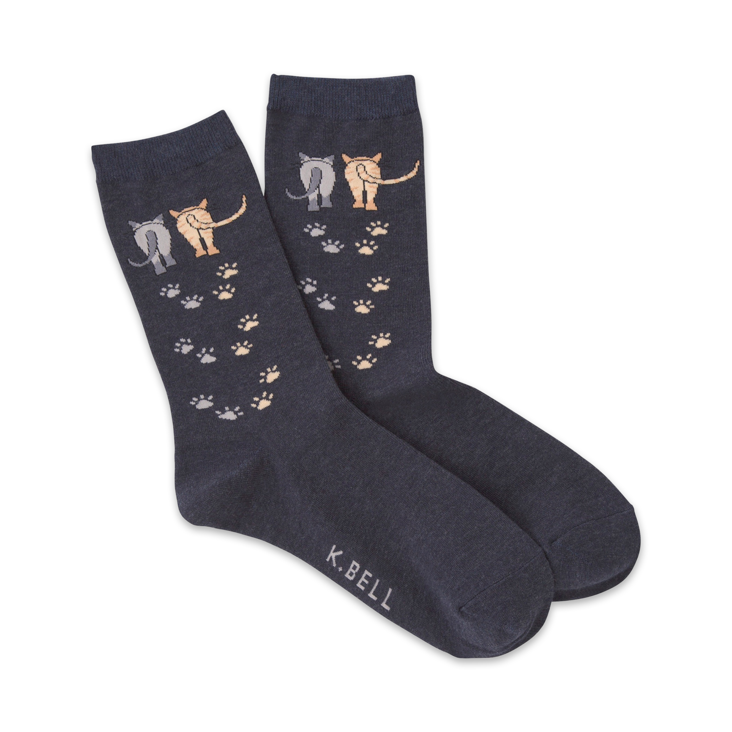 Pair of navy blue crew socks with a design of cat rear ends and paw prints in beige and gray.