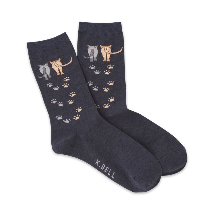 dark blue crew socks with cartoon cat butts in a line with light blue paw prints   }}