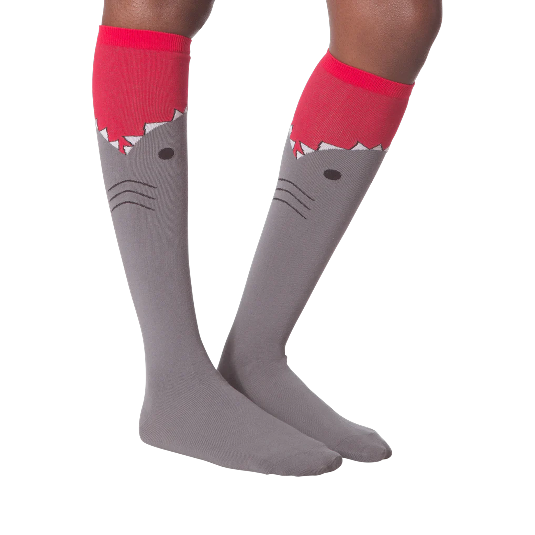 Another lifestyle shot of the shark knee-high socks on a model's legs.
