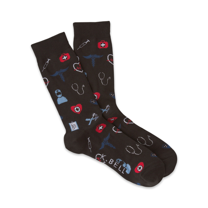  medical-themed socks in dark brown with red and blue accents featuring stethoscope, syringe, heart & first aid kit symbols. mens crew length.   }}