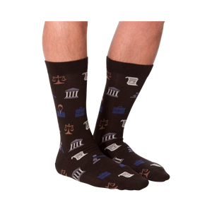 Lifestyle shot: A model is wearing the dark brown Lawyer socks, showcasing how they look on feet.