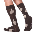 Lifestyle shot showing the Middle Finger socks on a person's legs, showcasing how the socks look when worn.