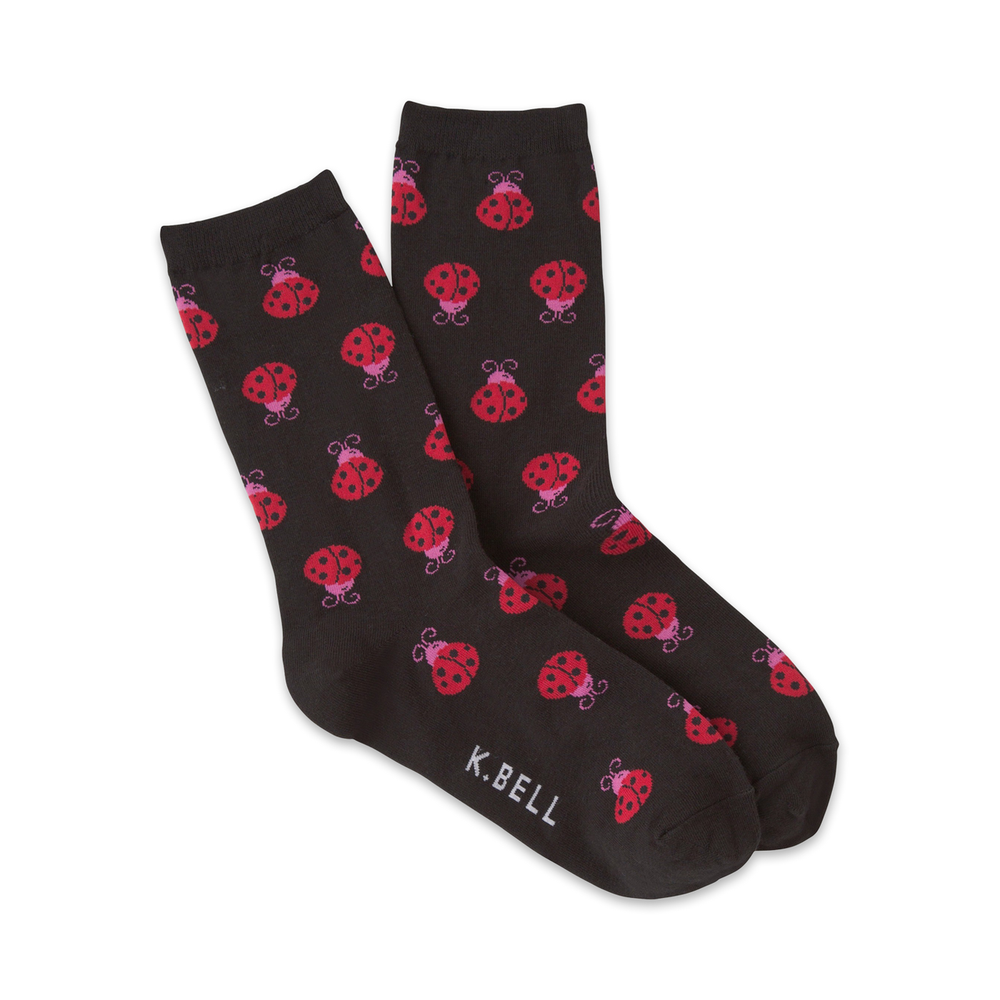 Pair of dark grey crew socks with a repeating pattern of red and pink ladybugs.  K.Bell logo on the bottom.