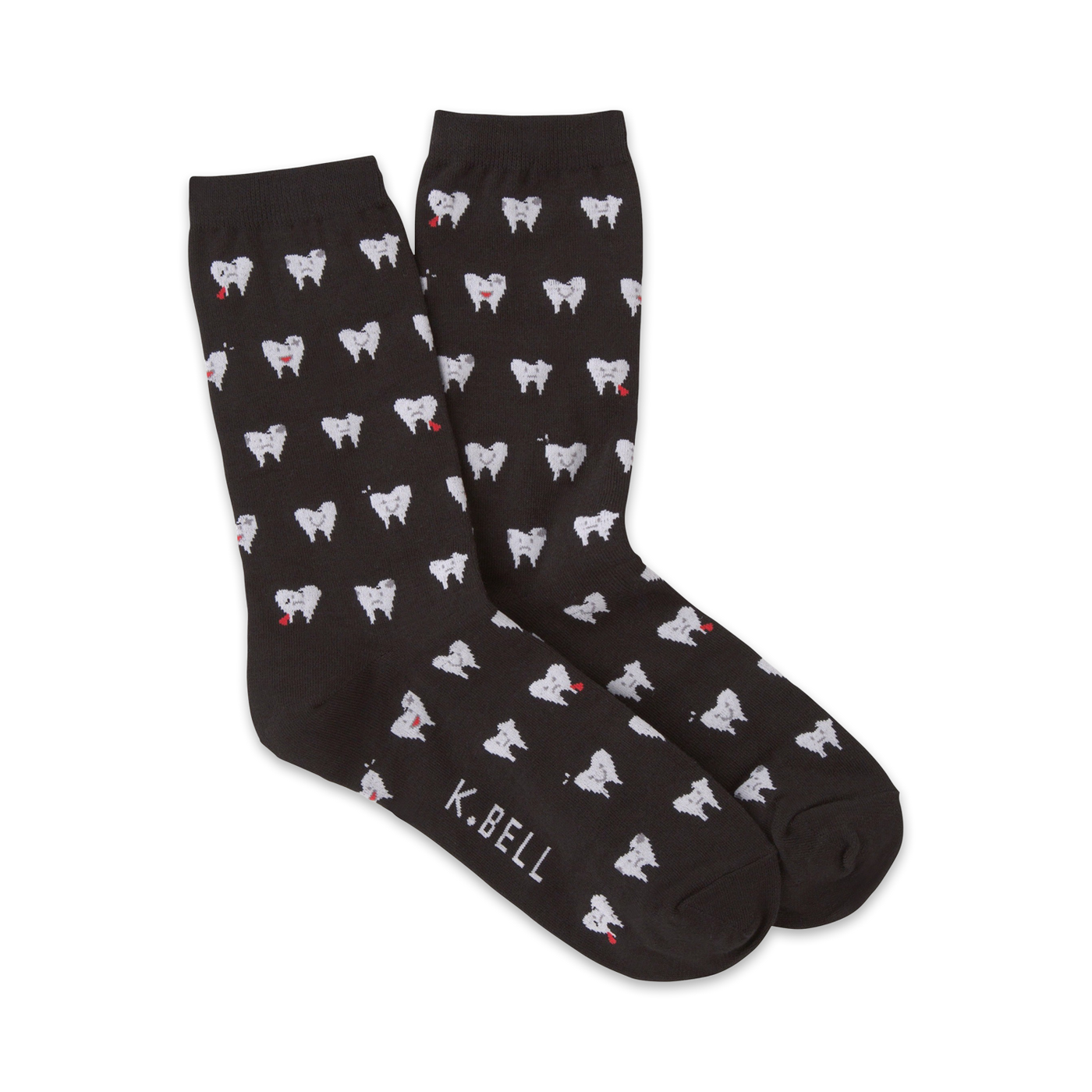 Pair of dark gray crew socks with a repeating pattern of white teeth and small red hearts. The socks are made by K.Bell.