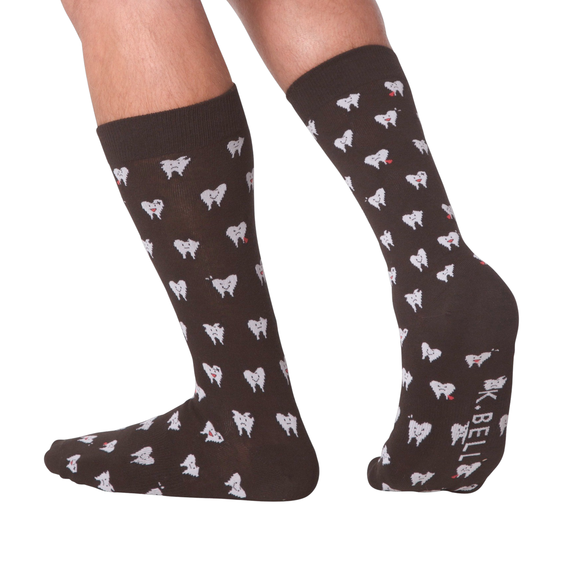 Lifestyle shot showing the socks on a person's feet.  The socks are dark brown with a tooth pattern. The image is on a black background.