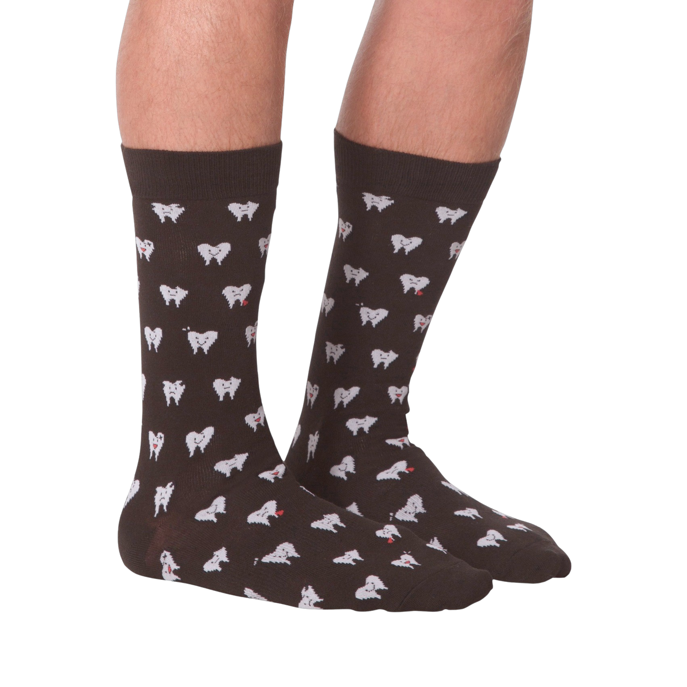 Another lifestyle shot showing the socks on a person's feet, this time from the front.  The socks are dark brown with a tooth pattern. The image is on a black background.