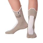 Lifestyle shot showing Shark Wide Mouth socks on a person's legs.