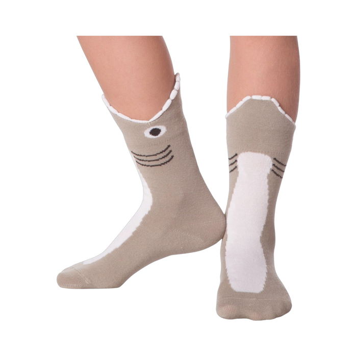 Lifestyle shot showing Shark Wide Mouth socks on a person's legs.