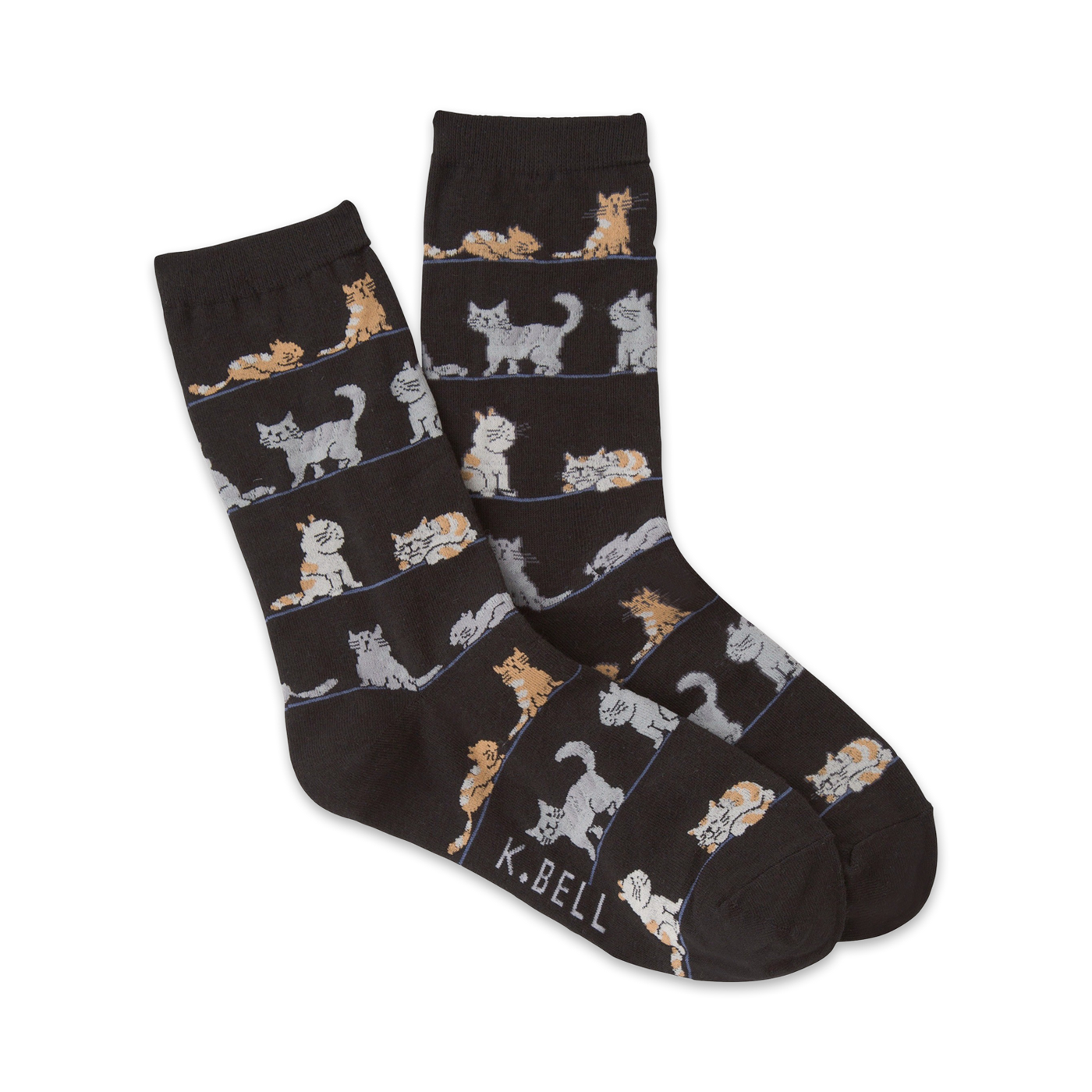 A pair of dark-grey crew socks with a repeating pattern of light-grey, orange, and white cats in various poses.