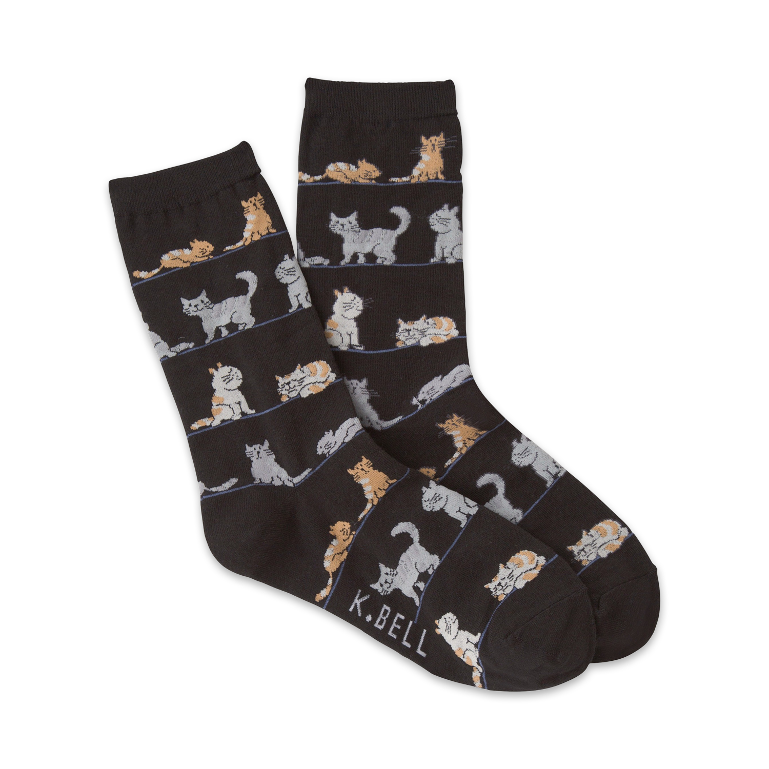 A pair of dark-grey crew socks with a repeating pattern of light-grey, orange, and white cats in various poses.