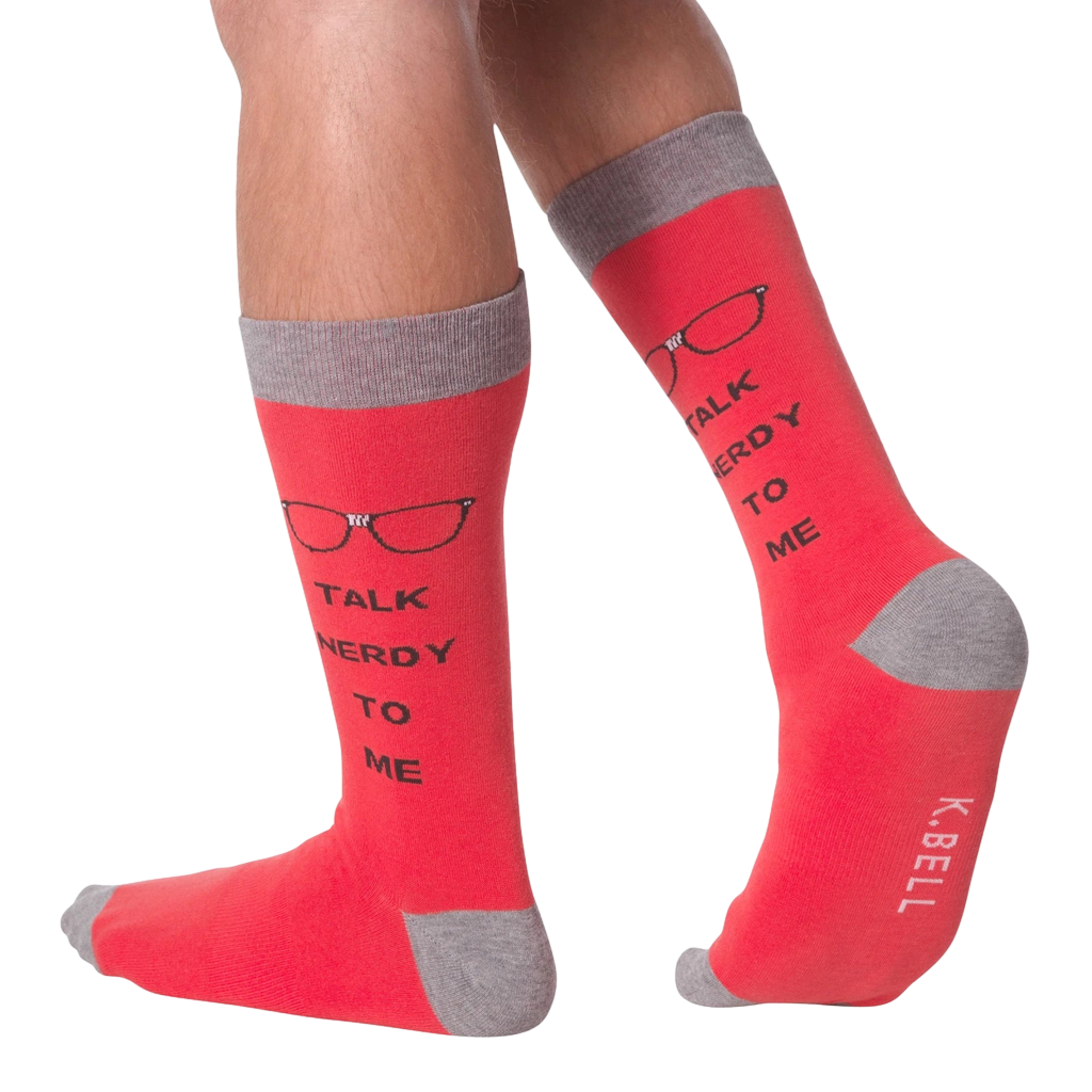 Lifestyle shot of a model wearing a pair of red 'Talk Nerdy To Me' socks.