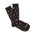 Pair of black crew socks with a colorful pixel art superhero design.  Superheroes in red, blue, yellow, and green are scattered across the socks.