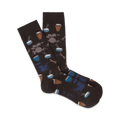 Pair of dark brown crew socks with a pattern of illustrated drums, drumsticks, and cymbals in blue and brown.