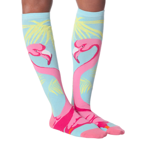 Close-up shot showcasing the flamingo knee-high socks' design details and vibrant colors.