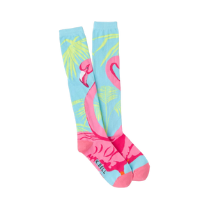 Pair of women's knee-high socks. Light blue background with pink flamingos and yellow-green palm leaves.