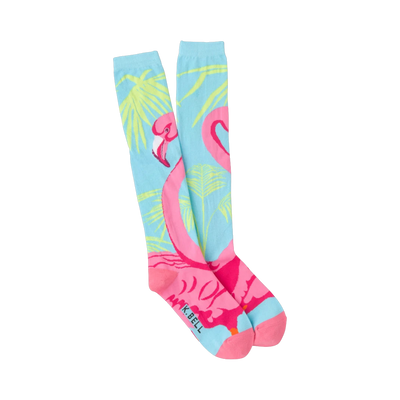 Pair of women's knee-high socks. Light blue background with pink flamingos and yellow-green palm leaves.