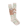 A pair of beige knee-high socks with a playful illustration of sloths sharing bananas amidst scattered green leaves.