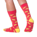 Lifestyle photo showing the taco socks on a person's feet.