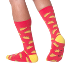 Lifestyle photo showing the taco socks on a person's feet.