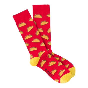 red crew socks featuring a pattern of tacos with lettuce, tomatoes, and cheese on a yellow background, perfect for the taco enthusiast in your life.  
