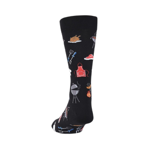 Back view of black crew socks showcasing the full BBQ-themed design.