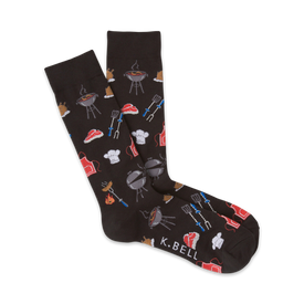  black crew socks with bbq grilling design featuring tongs, spatulas, aprons, flames, and meat.   
