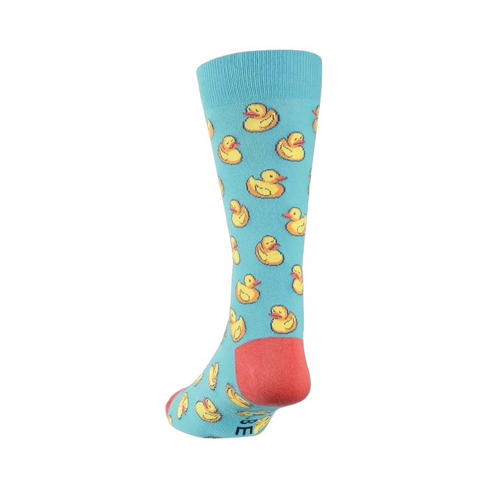 Back view of a light blue crew sock with yellow rubber duck pattern. Coral-colored heel and toe visible.