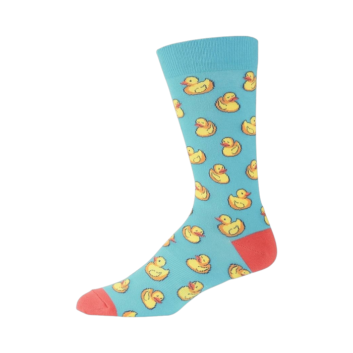 Side view of a light blue crew sock with yellow rubber duck pattern. Coral-colored heel and toe visible.